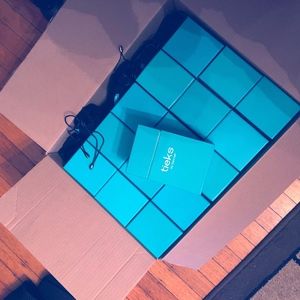 Empty Tieks boxes.